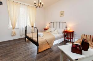 Postel nebo postele na pokoji v ubytování Prior Suites Split