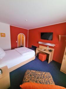Postel nebo postele na pokoji v ubytování Hotel Silberhorn
