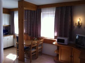 Kuchyň nebo kuchyňský kout v ubytování Hotel Garni Pfandl