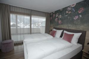 Posteľ alebo postele v izbe v ubytovaní Hotel Goldener Adler