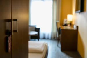 Letto o letti in una camera di Montfort - das Hotel