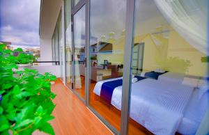 Postel nebo postele na pokoji v ubytování Bách Thảo Hotel + 37 fotografií