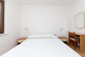 Postel nebo postele na pokoji v ubytování Apartment Marija