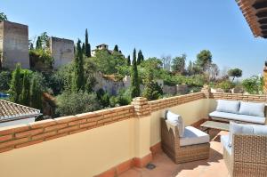 Un lugar para sentarse en Loft Dar al- Horra , Terraza, parking & Vistas