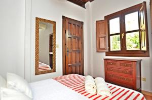 Una cama o camas en una habitación de Loft Dar al- Horra , Terraza, parking & Vistas