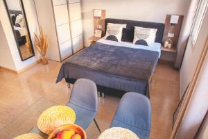 Postel nebo postele na pokoji v ubytování Aparthotel Costa Blanca