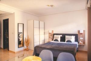 Postel nebo postele na pokoji v ubytování Aparthotel Costa Blanca