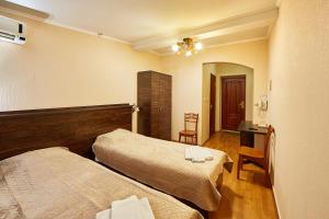 Postel nebo postele na pokoji v ubytování Hotel Barbaris