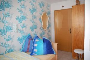 Postel nebo postele na pokoji v ubytování Gästehaus Sylvie
