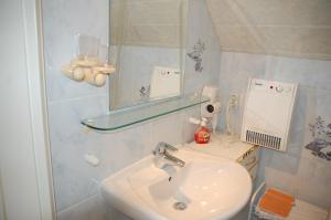 Ванна кімната в Gästehaus Sylvie