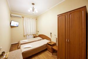 Postel nebo postele na pokoji v ubytování Hotel Barbaris