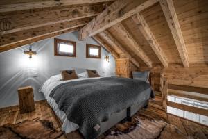 Postel nebo postele na pokoji v ubytování Les Mazots du Clos