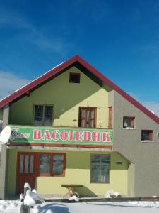 a large building with a bagel bite sign on it at Vila Vasojević in Nova Varoš