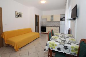 Kuchyňa alebo kuchynka v ubytovaní Apartmani Radan