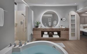 Baðherbergi á Hotel Weisses Roessl