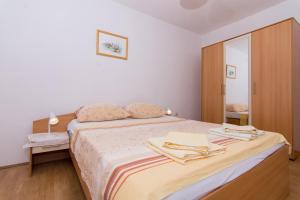 Cama o camas de una habitación en Apartments Slanada