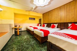 מיטה או מיטות בחדר ב-Hotel San Marcos