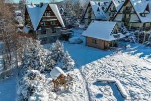 Apartament Fiedorówka om vinteren
