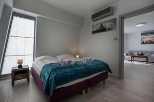Postel nebo postele na pokoji v ubytování Aparthotel Baltic Spa