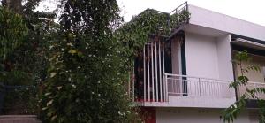 Balkón nebo terasa v ubytování Riverbench Homestay Munnar, Anaviratty