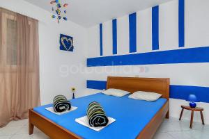 Posteľ alebo postele v izbe v ubytovaní Holiday home Darius with Hot tub + 18 fotografií