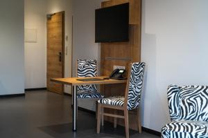 TV a/nebo společenská místnost v ubytování Hotel No151