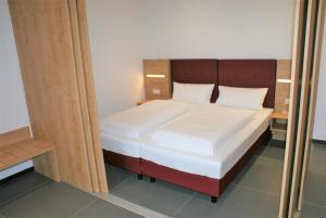 Postel nebo postele na pokoji v ubytování Hotel No151