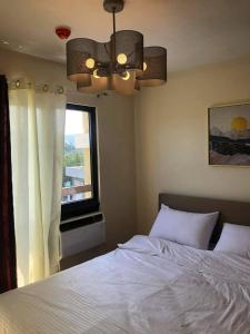 Postel nebo postele na pokoji v ubytování Lou Condo Rental