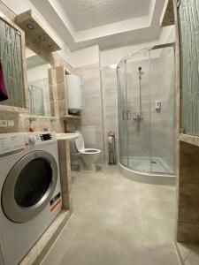 Kúpeľňa v ubytovaní Bon Voyage Apartments