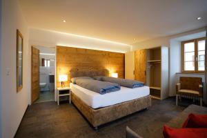 Postel nebo postele na pokoji v ubytování Hotel Bellevue