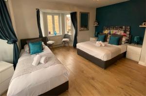 Cama ou camas em um quarto em Short Stays, Beautiful Serviced Accommodation Bicester