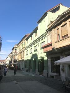 a group of buildings on a city street at Amazing Savoya nr1 Loft Old City Center Self check-in in Timişoara