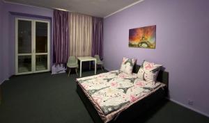 Posteľ alebo postele v izbe v ubytovaní Bon Voyage Apartments