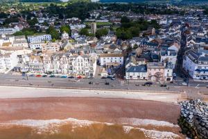 an aerial view of a town with a beach at The Elizabeth in Sidmouth