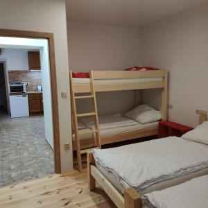 Postel nebo postele na pokoji v ubytování Apartmán Špacír
