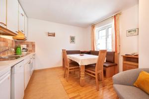 Kuchyň nebo kuchyňský kout v ubytování Apartments Geistlinger