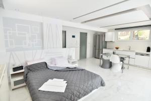 Ένα ή περισσότερα κρεβάτια σε δωμάτιο στο Alpha Delta Pool Suite +37 φωτογραφίες