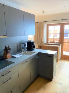 A kitchen or kitchenette at APART24 Még 4 kép