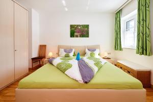 Postel nebo postele na pokoji v ubytování Apartments Geistlinger
