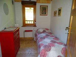 Ένα ή περισσότερα κρεβάτια σε δωμάτιο στο la finestra sul Monviso