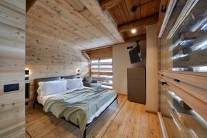 En eller flere senge i et værelse på Agriturismo Botondoro