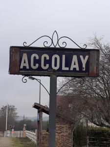 a sign for a academy on a pole at La Caudalie 