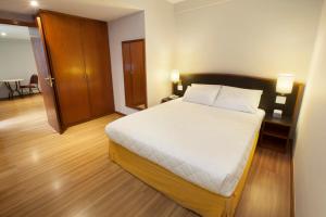 Postel nebo postele na pokoji v ubytování Hotel Moncloa