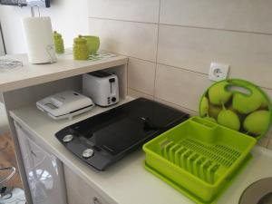 Kuchyň nebo kuchyňský kout v ubytování Apartman NINA Wind Resort