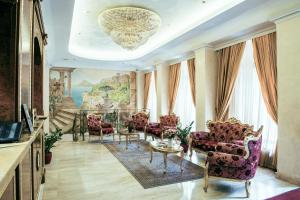 TV a/nebo společenská místnost v ubytování Optima Collection Podil Plaza