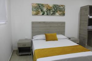 Postel nebo postele na pokoji v ubytování Hotel San Francisco Real