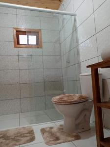 Et badeværelse på Cabana Caminho das Borboletas