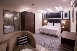 Olive Tree Hotel客房内的一张或多张床位
