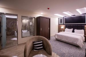 Olive Tree Hotel客房内的一张或多张床位