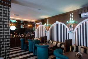 Olive Tree Hotel的休息区